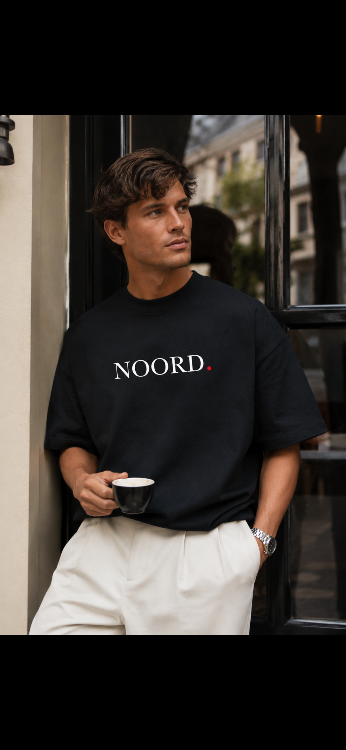 Unisex T-shirt met noord opdruk in zwart, rode stip Wear Your City Amsterdam